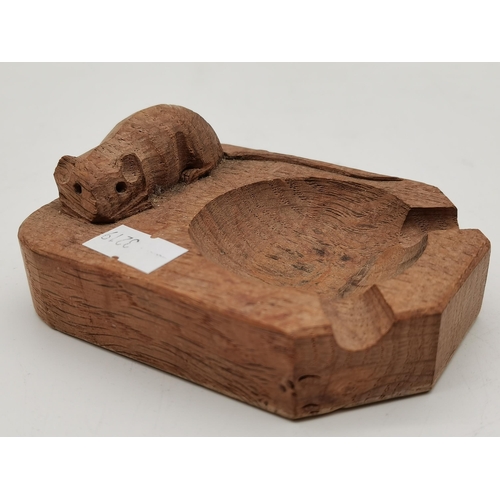 242 - Robert Thompson, a Mouseman oak ashtray, of typical form, with carved mouse signature; together with... 