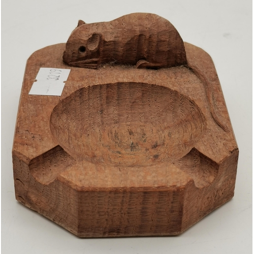 242 - Robert Thompson, a Mouseman oak ashtray, of typical form, with carved mouse signature; together with... 