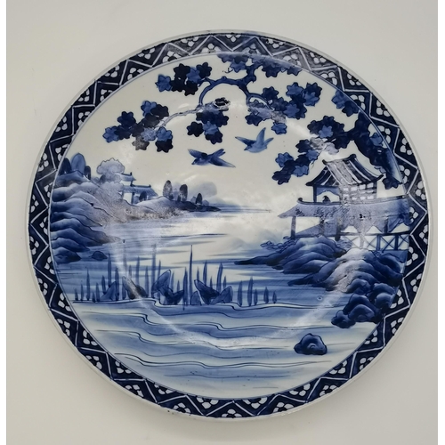 29 - Chinese blue and white porcelain platter hand painted with mother and child in a landscape, 35cm wid... 