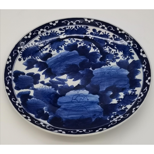 29 - Chinese blue and white porcelain platter hand painted with mother and child in a landscape, 35cm wid... 