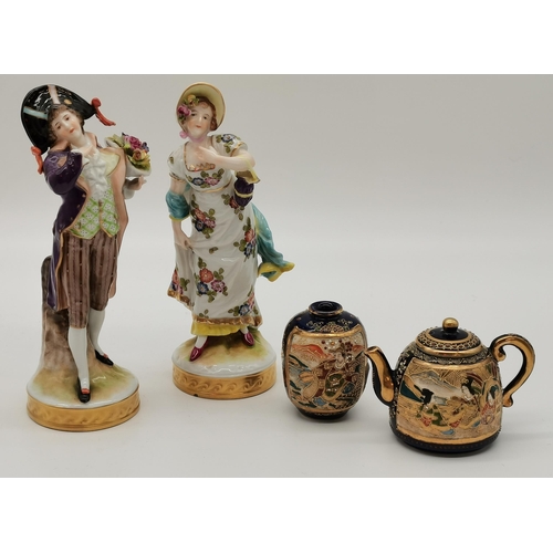 271 - Two Volkstedt porcelain figures, a male and a female, Germany, c.1945; together with a miniature Jap... 