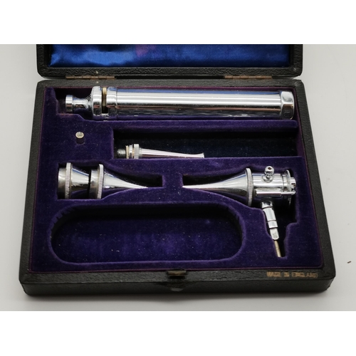 322 - Three medical instruments, comprising a military issued auriscope/otoscope by Gowllands Ltd, c.1940-... 