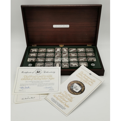 391 - World Wildlife Fund, 'The World in Danger', a cased set of thirty Elizabeth II proof sterling silver... 