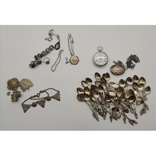 394A - A quantity of mixed silver and white metal items, British and foreign, including a silver-cased open... 