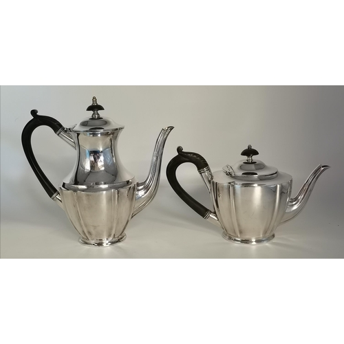 397 - A silver-plated teapot and coffee pot by Walker & Hall, Sheffield 1930, each with lobed sides and pl... 