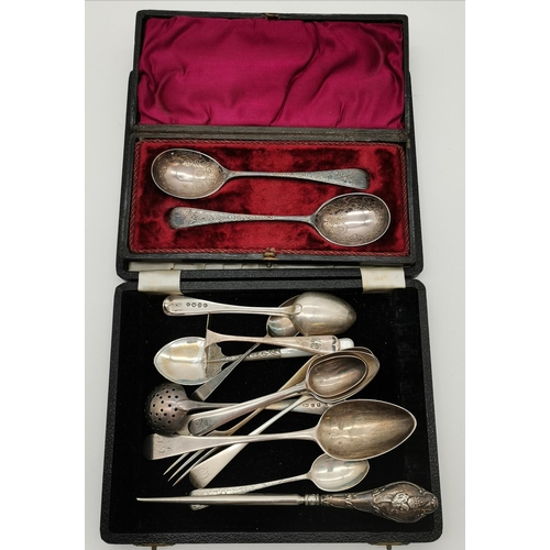 403 - A quantity of assorted silver spoons, etc., George III and later, including a late Victorian pair of... 