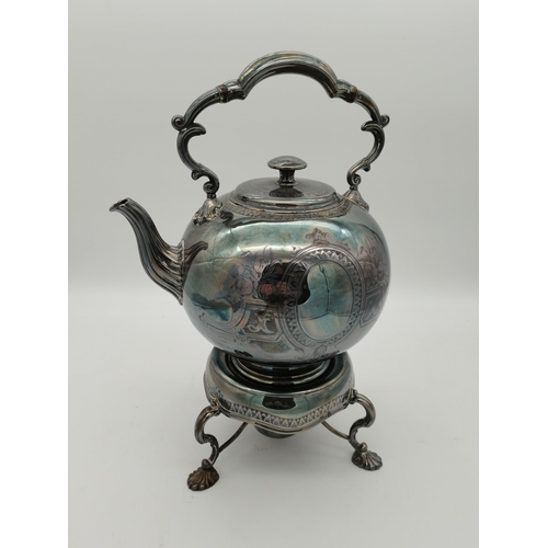 406 - A silver-plated spirit kettle on stand, late 19th Century, globular, with shell-capped fixed scrolli... 