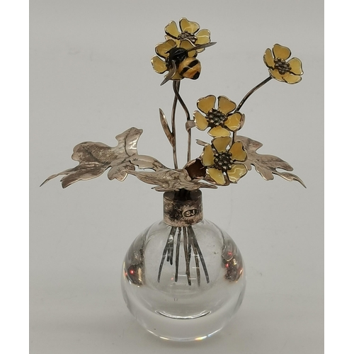 409A - An Elizabeth II silver and enamel posy of buttercups in a globular silver-mounted vase by Sarah Jone... 