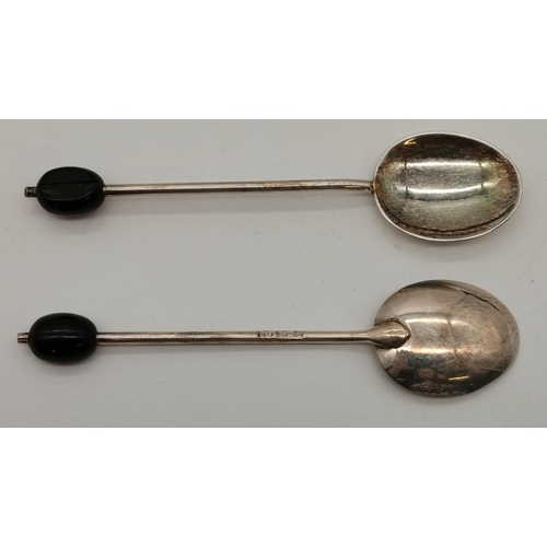 411 - Three assorted sets of silver tea and coffee spoons, 20th Century, comprising twelve George V silver... 