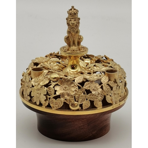 412A - An Elizabeth II silver-gilt commemorative centrepiece, 'The Bowes-Lyon Candleholder', by Hector Mill... 