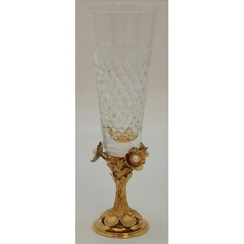 414A - An Elizabeth II silver-gilt commemorative jewelled goblet by Hector Miller, London 1982, limited edi... 