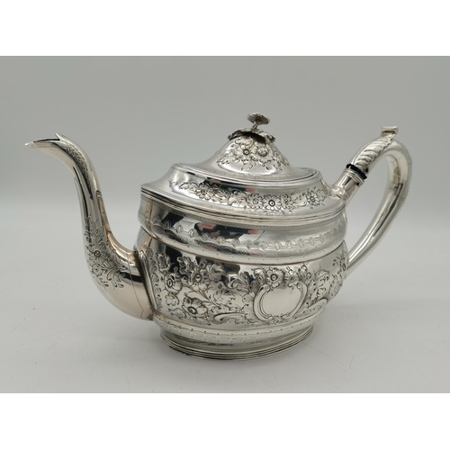 417 - A George III silver teapot by Peter, Ann & William Bateman, London 1805, oval, chased with scrolling... 