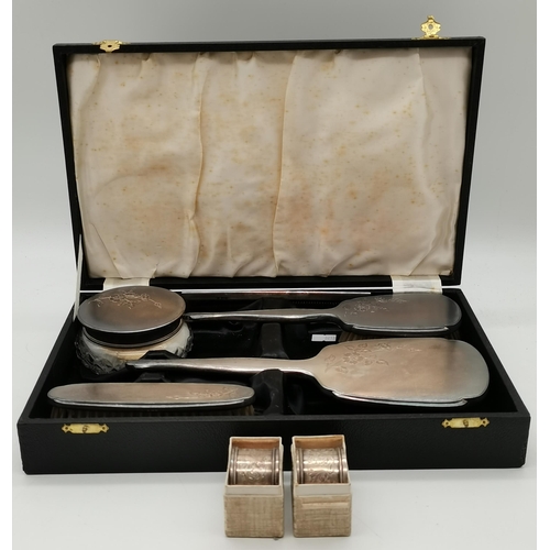 463A - An Elizabeth II silver five-piece dressing table set by Adie Brothers Ltd, Birmingham 1955, 1956 and... 