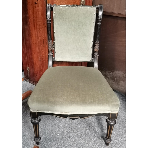 932 - Victorian Ebonised nursing chair with green velvet seat and back