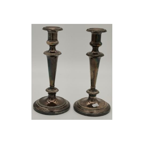 409 - A pair of Elizabeth II silver candlesticks by Barker Ellis Silver Co, Sheffield 1978, the tapering s... 