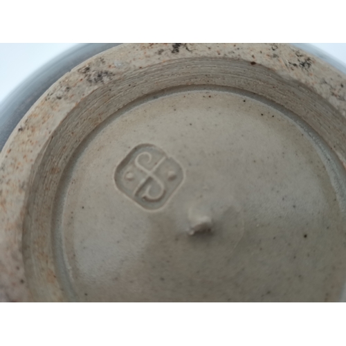 125 - A Leach Pottery, St.Ives large stoneware bowl, decorated with flowers to the well, black rim and ext... 