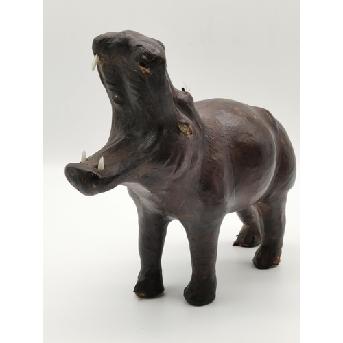 1 - A large Liberty-style leather hippopotamus standing with mouth agape, with plastic teeth; together w... 