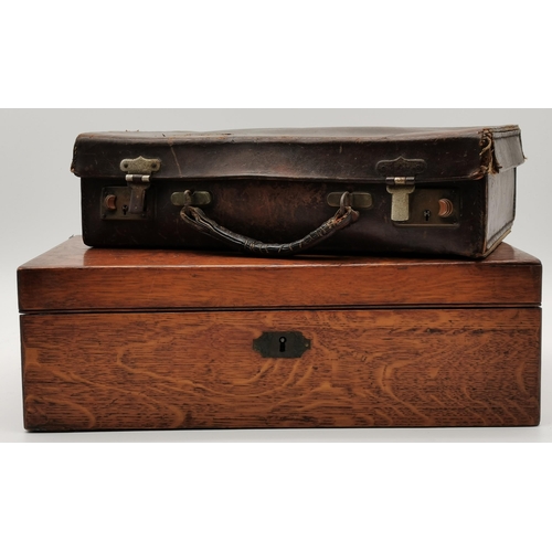 42 - An oak writing box, with purple velvet slope, the brass cartouche to cover engraved with initials; t... 