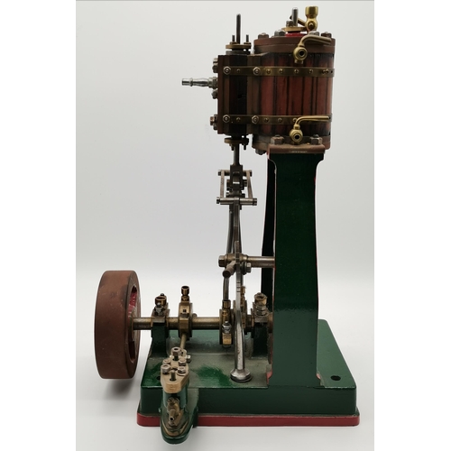 74 - A vertical steam engine model locomotive with reverse, seemingly unmarked, the bodywork painted gree... 