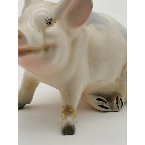 97 - A collection of assorted pig models, Beswick, Aynsley, Border Fine Arts, Goebel and others, includin... 