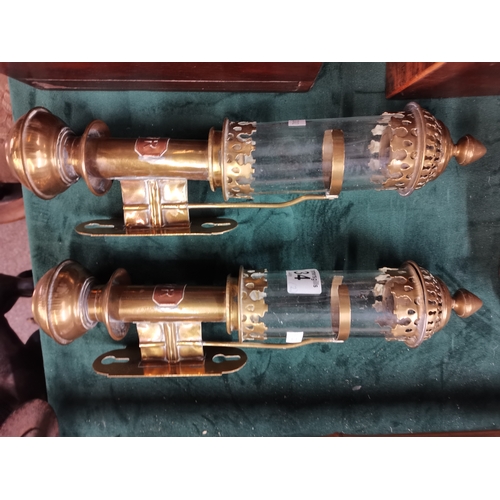 34 - A pair of Victorian brass railway carriage lamps, wall-mounted, with GWR copper name plaques. (2) 35... 