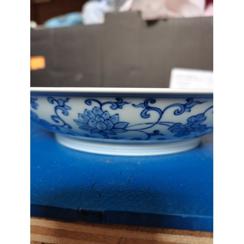 56 - A Ming style Chinese blue and white dish 20cm with six character mark and having floral decoration