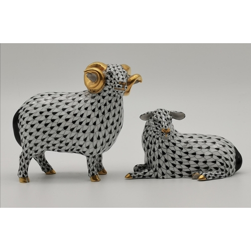 107 - A Herend porcelain ram, decorated in black and white, with gilt nose, horns and hooves, blue printed... 