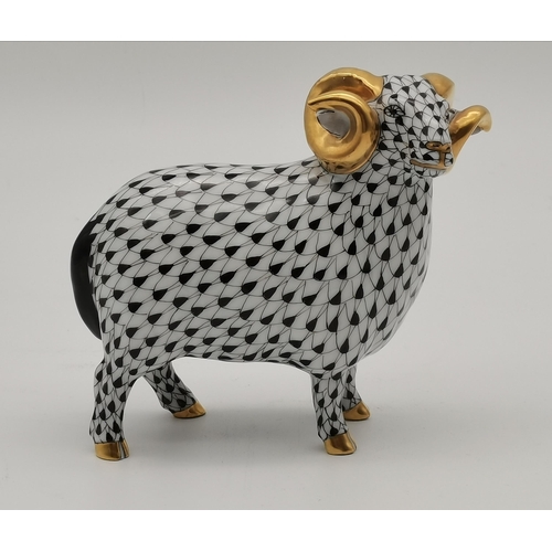 107 - A Herend porcelain ram, decorated in black and white, with gilt nose, horns and hooves, blue printed... 