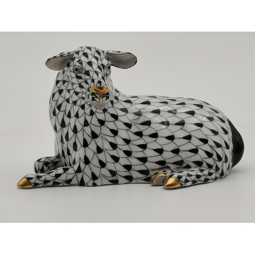 107 - A Herend porcelain ram, decorated in black and white, with gilt nose, horns and hooves, blue printed... 