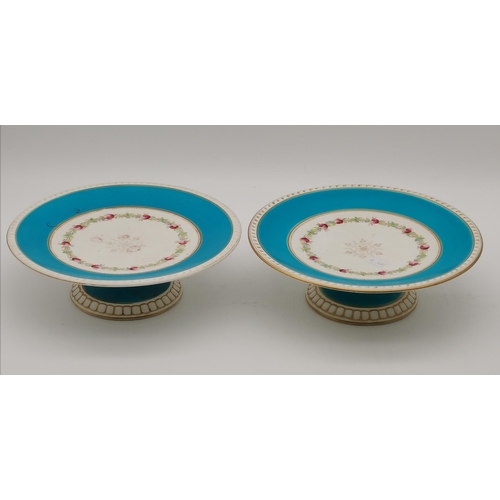 151 - A Pair of late 19th century Royal Worcester Botanical porcelain desert plates and cake stands with h... 