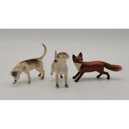 156 - A Collection of Beswick Animals including Turtle Doves 1022, fox and 2 hounds plus Highland calf