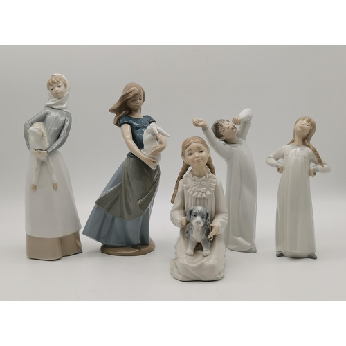 163 - A collection of 3 Lladro and 2 Nao figurines including Girl with Rabbit, Girl with Lamb, Boy Yawning... 