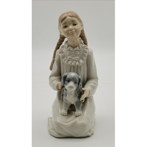 163 - A collection of 3 Lladro and 2 Nao figurines including Girl with Rabbit, Girl with Lamb, Boy Yawning... 