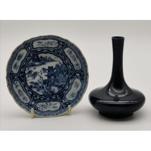 176 - A Chinese blue and white porcelain dish, with shaped edge, decorated to the well with a pagoda and t... 