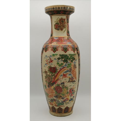 19 - Three tall Chinese vases, 20th Century, slender baluster with trumpet necks, variously decorated wit... 