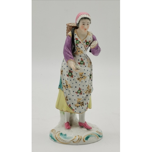 207 - Russian porcelain figure of Eskimo holding a fish, 14cm high, English Porcelain figurine of lady sel... 