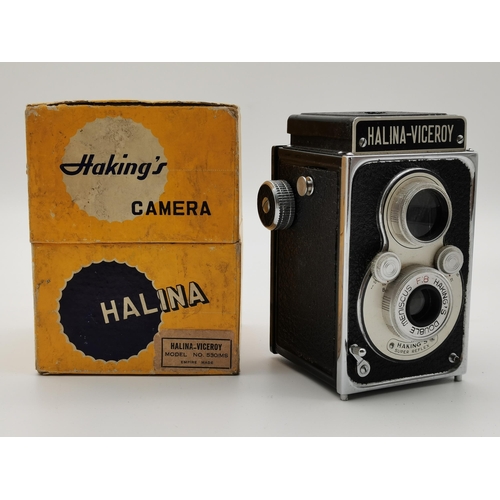 266 - A Polaroid Land Camera 1000, with ITT Magicflash Electronic Flash; together with a Haking's Halina-V... 