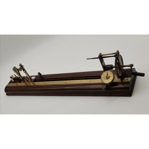 32 - A late 19th/early 20th Century mill yarn tester by J.H. Heal, Halifax, the brass instrument to a woo... 