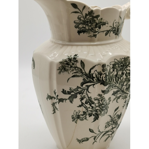 322 - A pair of Grange K & Co ceramic wash jugs decorated with green foliage to a cream ground, together w... 