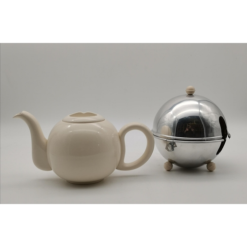 323 - A mid-century cream ceramic teapot, spherical, the Kosy Kraft style chrome cover insulated with felt... 