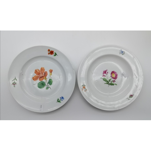 339 - A pair of Meissen porcelain floral plates, each with underglaze blue crossed swords mark to back, ha... 