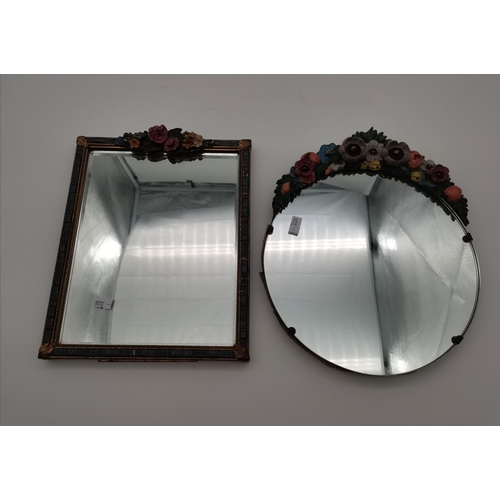 35 - Two floral encrusted mirrors, one wall-hanging, circular; the other rectangular with easel back. (2)... 