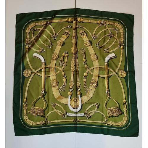 351 - A vintage Hermès silk scarf, Gaucho par Hermès, c.1980, green, designed by Caty Latham, with hand-ro... 