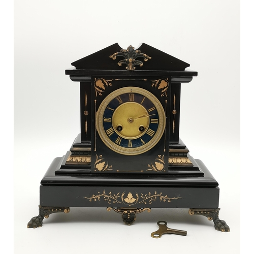 45 - A French slate mantel clock, the brass dial with blue enamel chapter ring with gilt Roman numerals a... 