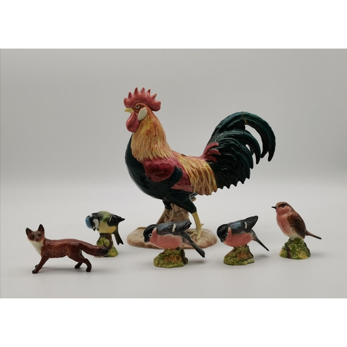 49 - A collection of assorted Beswick animal figures, comprising Leghorn cockerel, fox, and four small bi... 