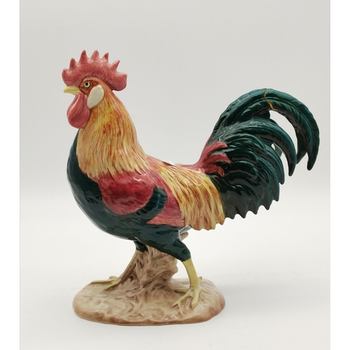 49 - A collection of assorted Beswick animal figures, comprising Leghorn cockerel, fox, and four small bi... 