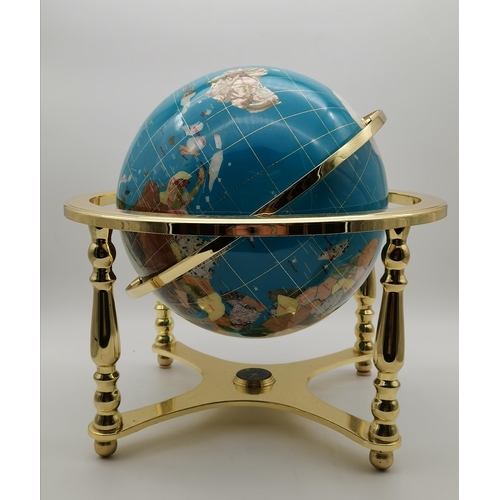 55 - A stone specimen table globe, 20th Century, on brass-effect stand with inlaid compass to base. Appro... 