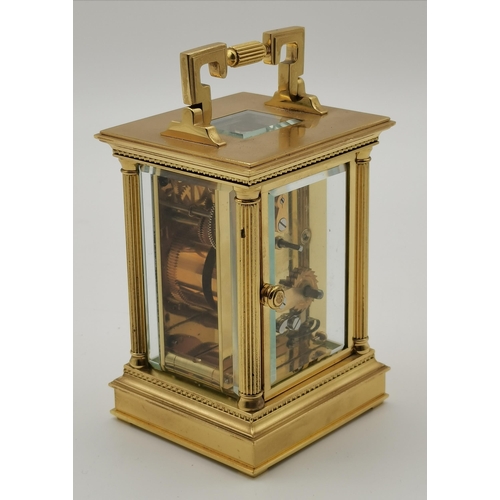 76 - A brass carriage clock, signed Matthew Norman, with black Roman numerals, the movement signed 11 Jew... 