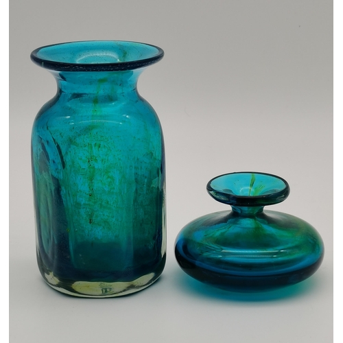 92 - Five pieces of blue glass wares, comprising three various small vases with trumpet necks, a small bo... 