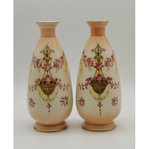 94 - A pair of Devonware ETNA vases by Crown Devon, tall ovoid with flared necks, each on a short circula... 